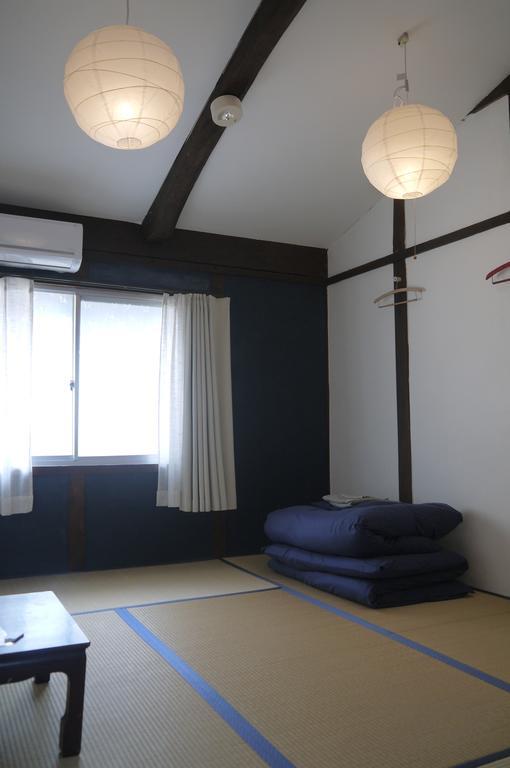 Minatoya Guesthouse Iki Zimmer foto